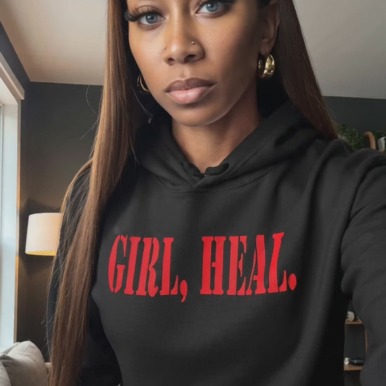 model wearing black GIRL, HEL. hoodie